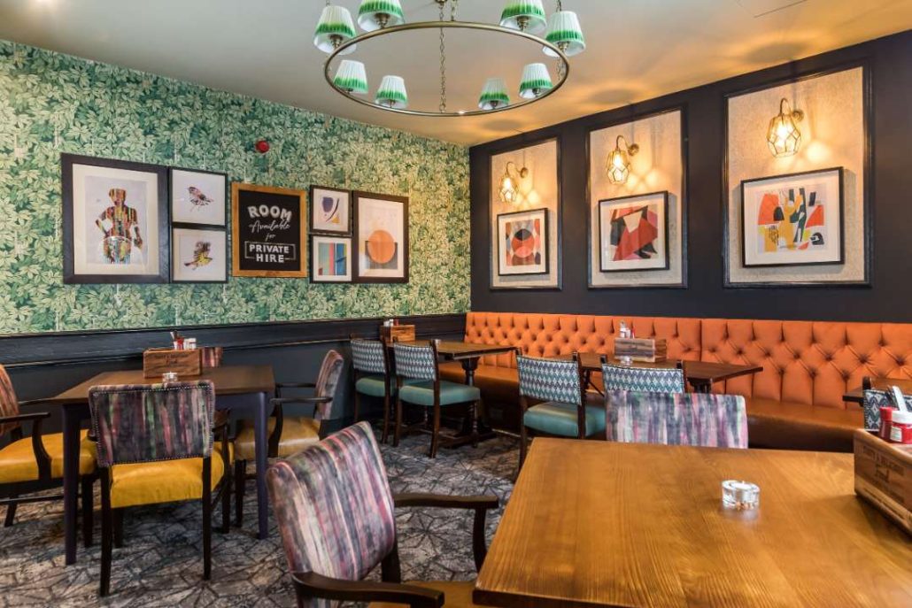 Semi private dining room at The Bear - with backbench seating and normal tables